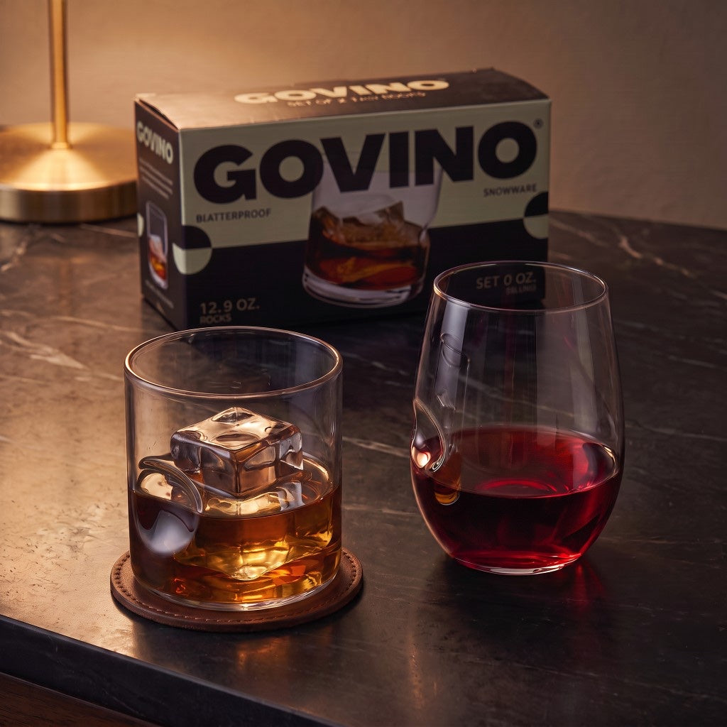 The Nightcap — Govino Wine and Rocks glasses on marble with whisky and wine