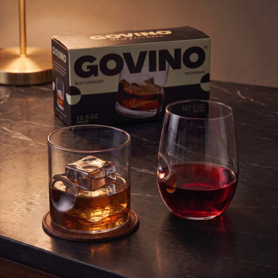 The Nightcap — Govino Wine and Rocks glasses on marble with whisky and wine
