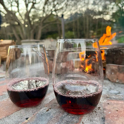 The Nightcap — shatterproof wine glasses by an outdoor fire pit